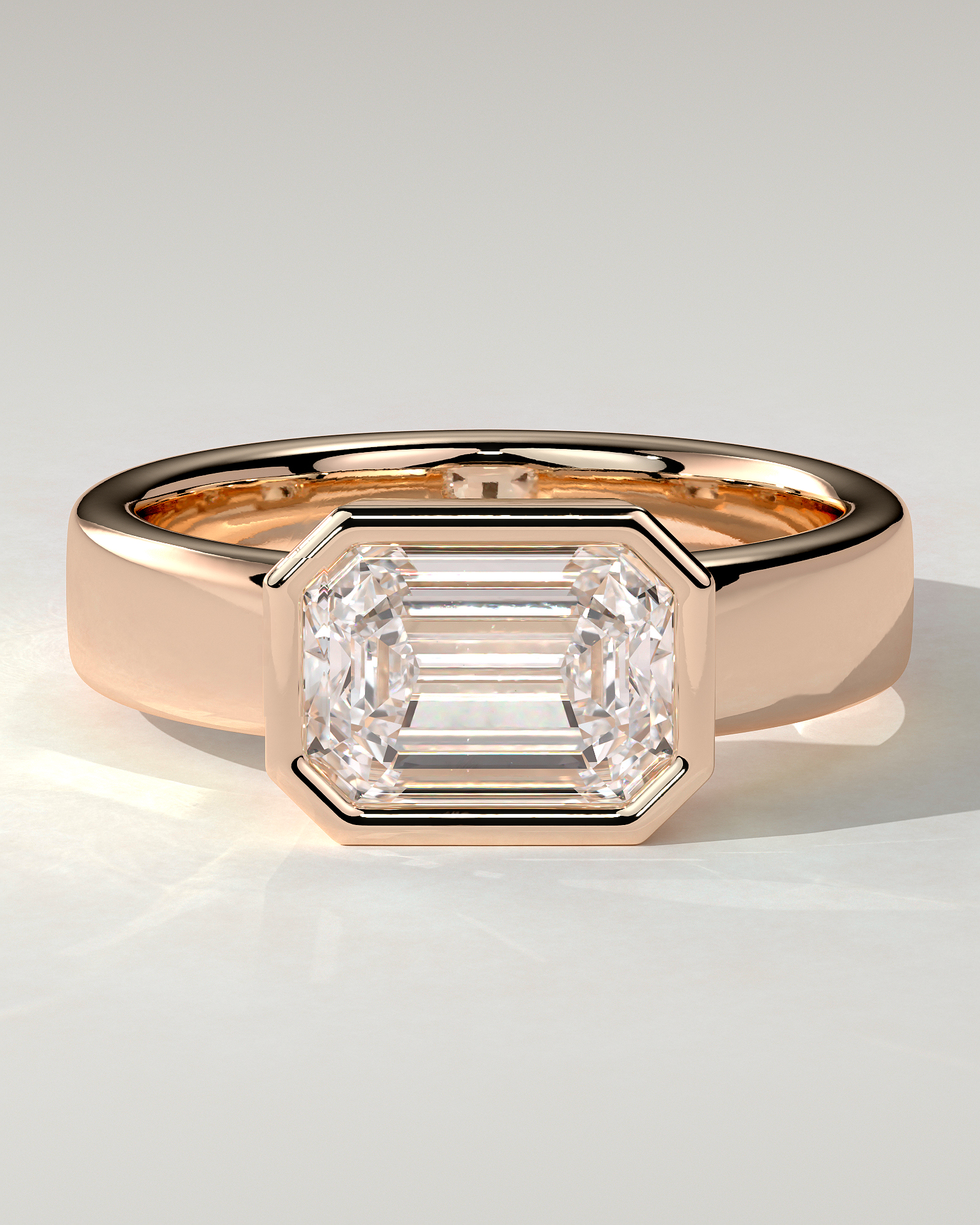 Adrian Bezel Emerald Ring