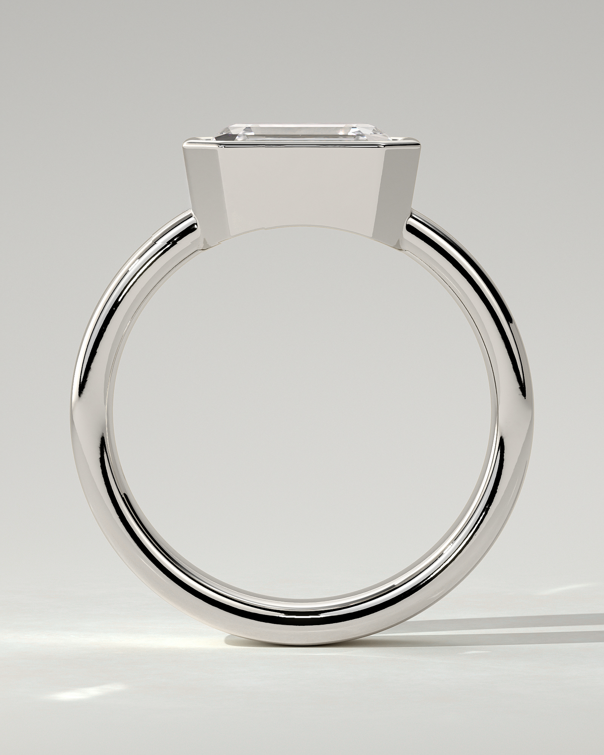 Adrian Bezel Emerald Ring