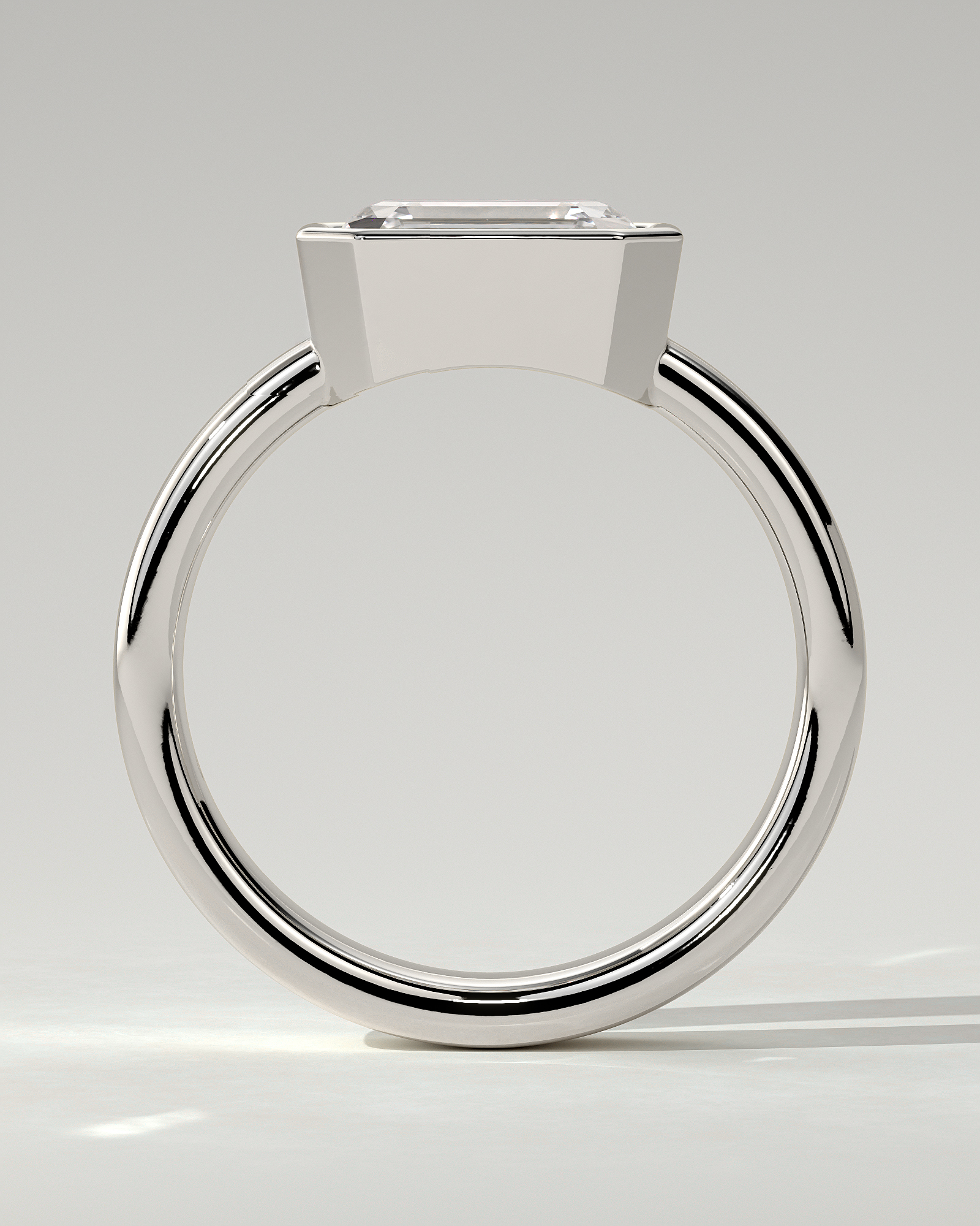 Adrian Bezel Emerald Ring