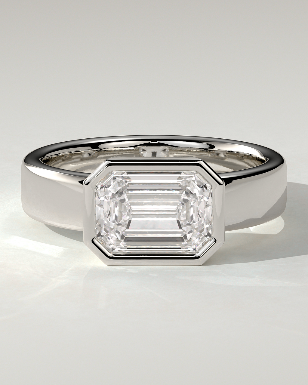 Adrian Bezel Emerald Ring