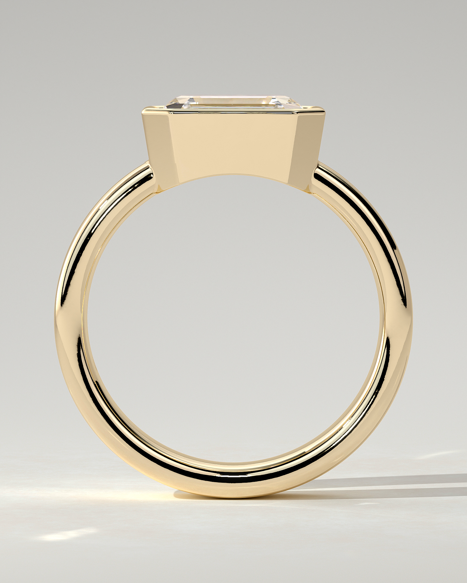 Adrian Bezel Emerald Ring