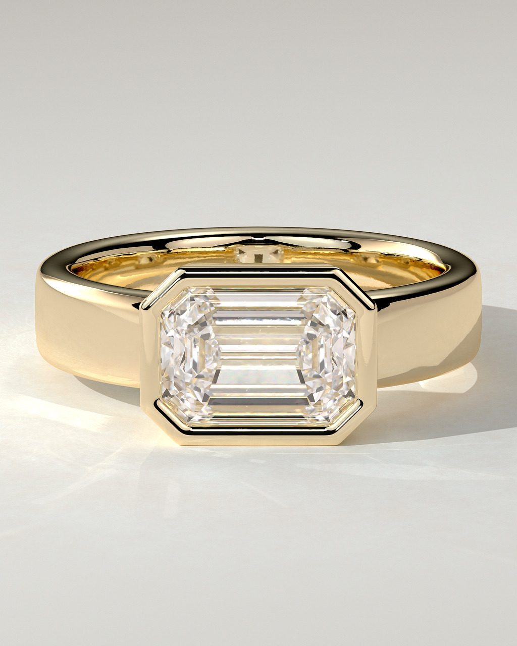 Adrian Bezel Emerald Ring
