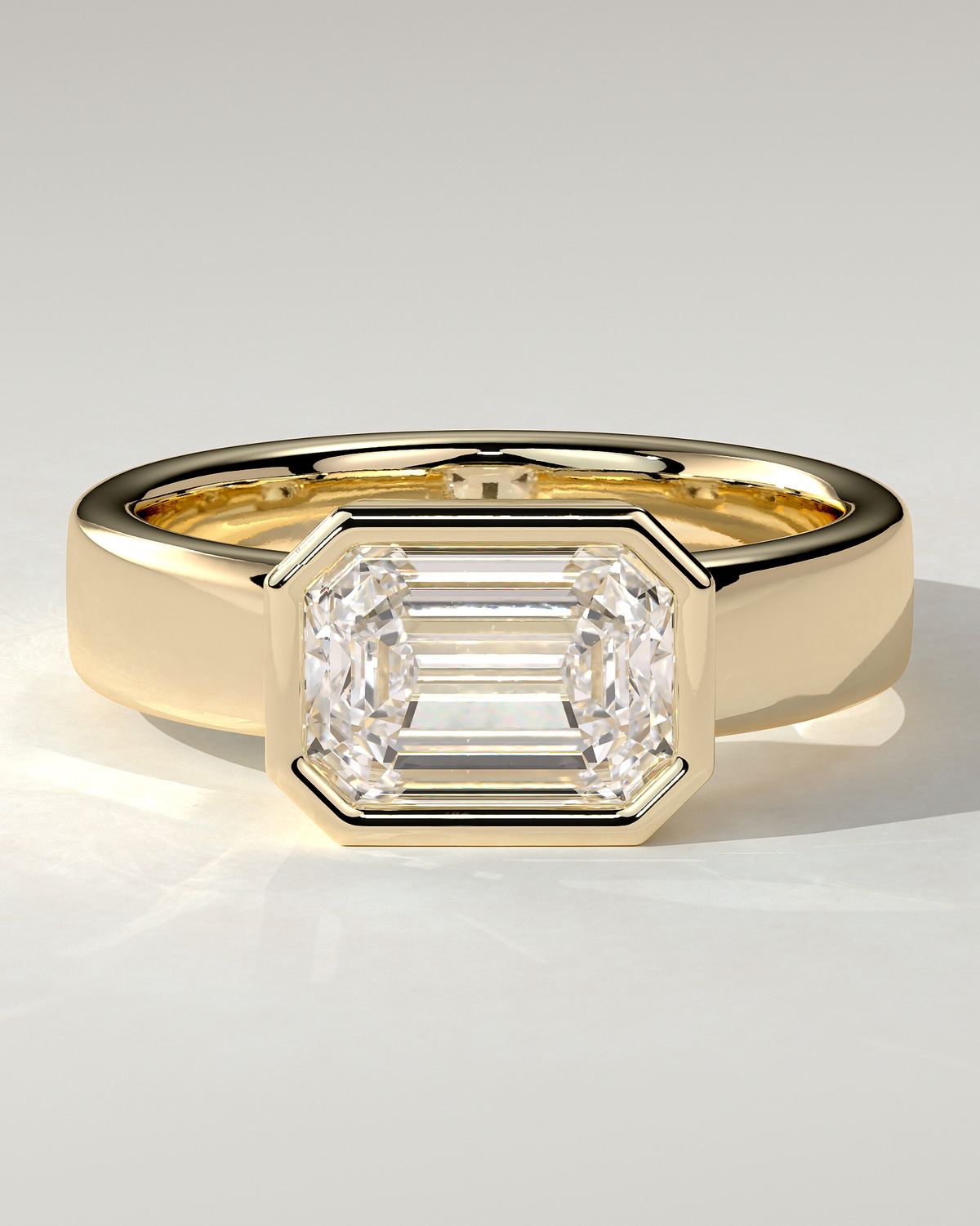 Adrian Bezel Emerald Ring