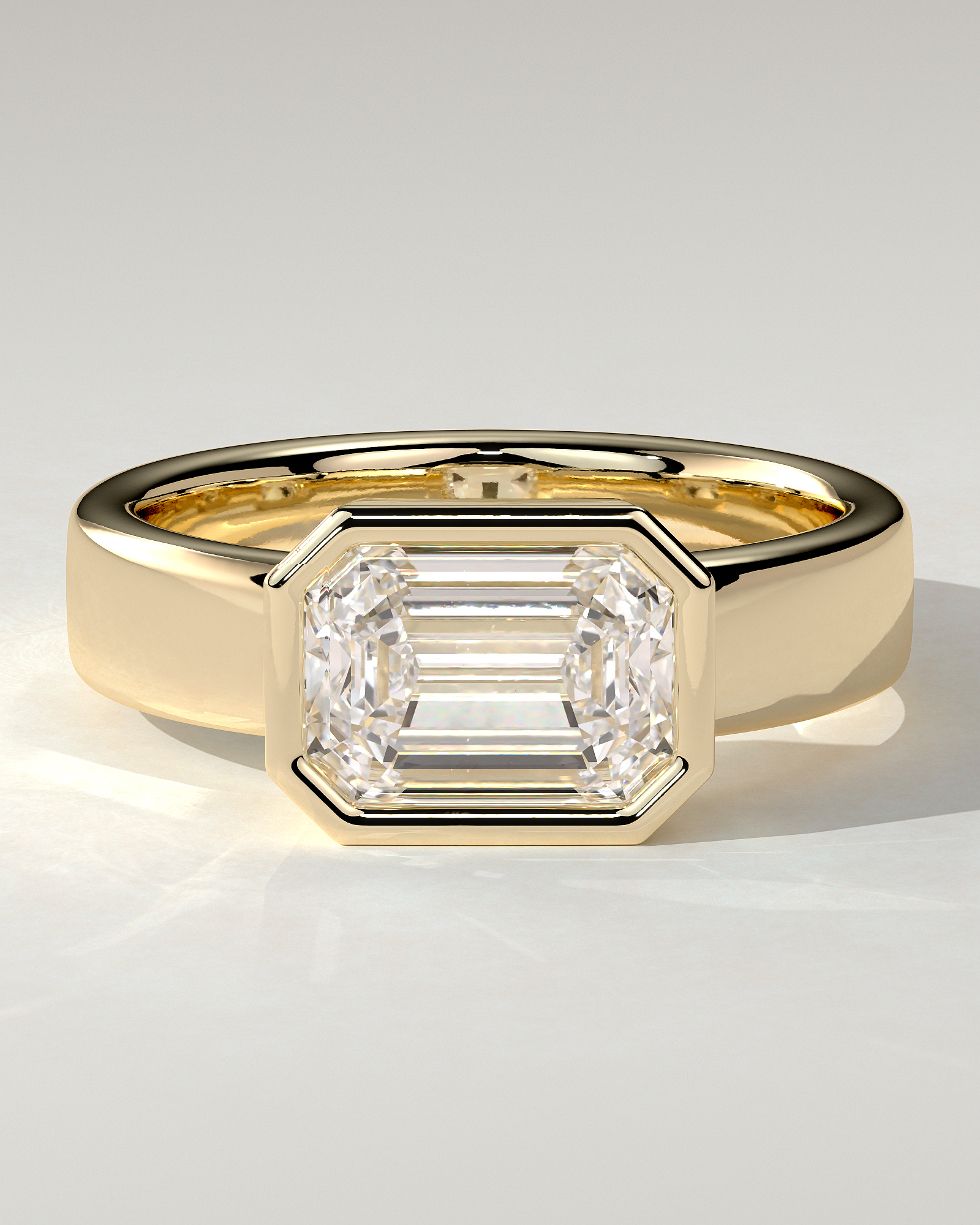 Adrian Bezel Emerald Ring
