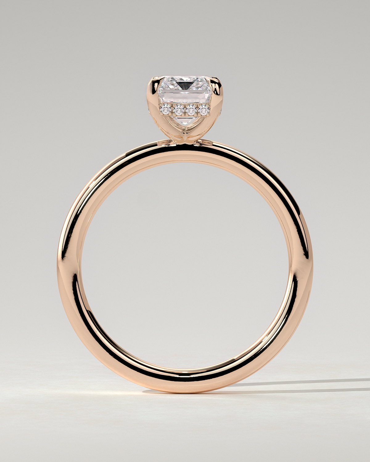 Alice Solitaire Emerald Ring