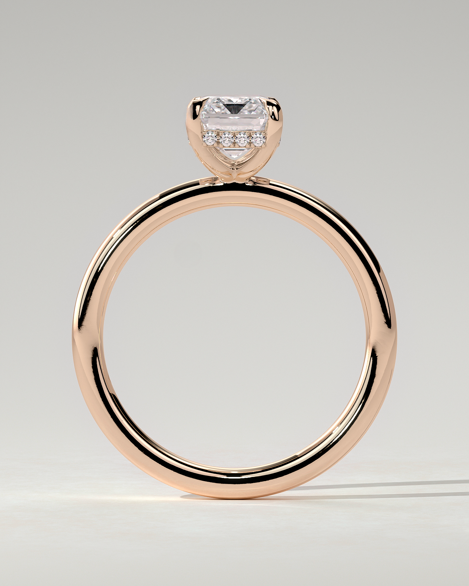 Alice Solitaire Emerald Ring