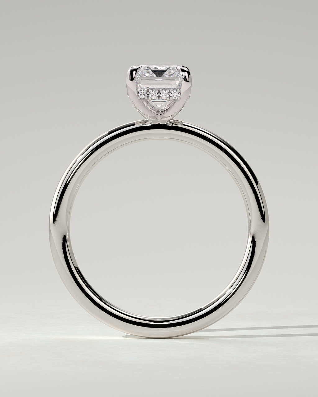 Alice Solitaire Emerald Ring