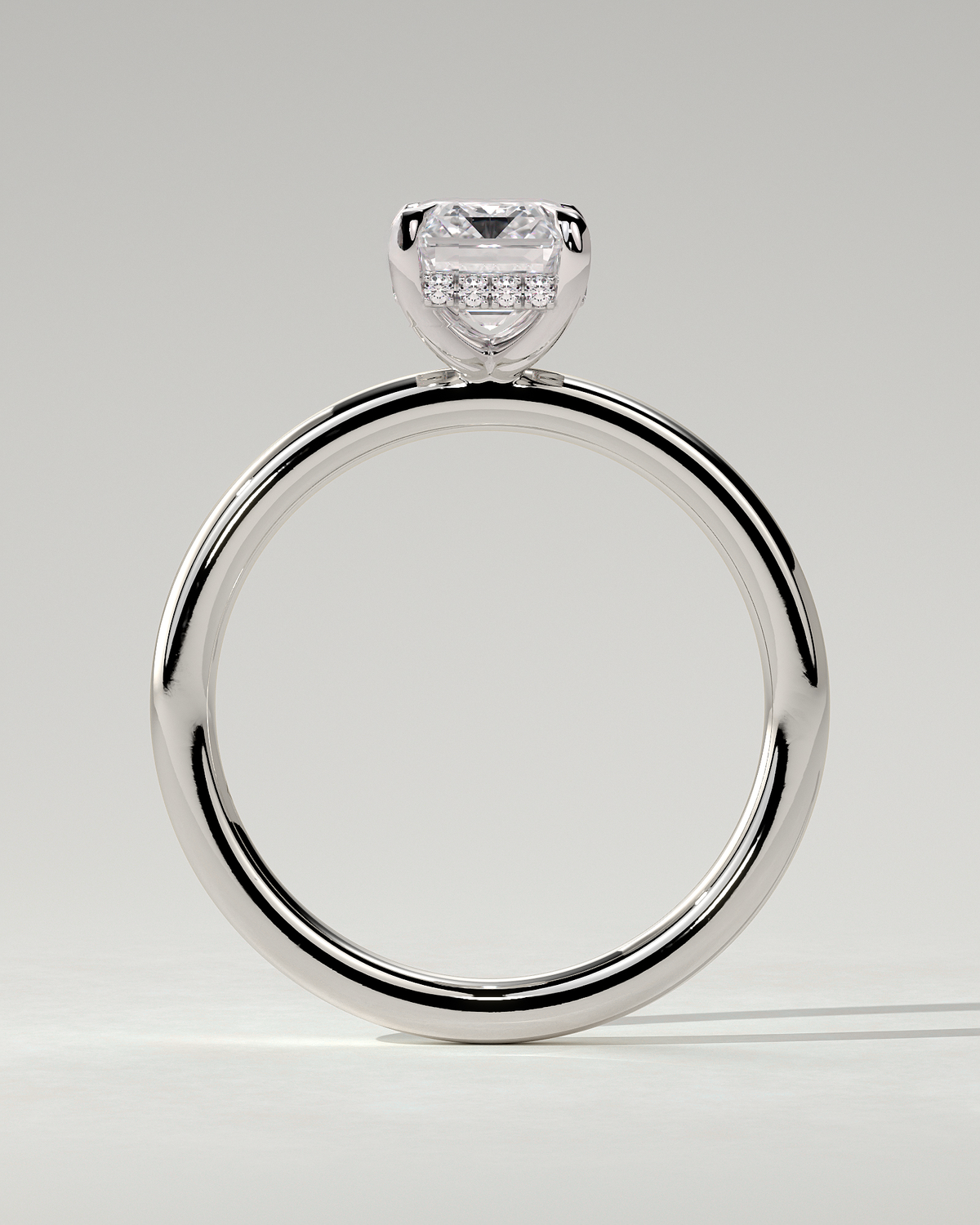 Alice Solitaire Emerald Ring