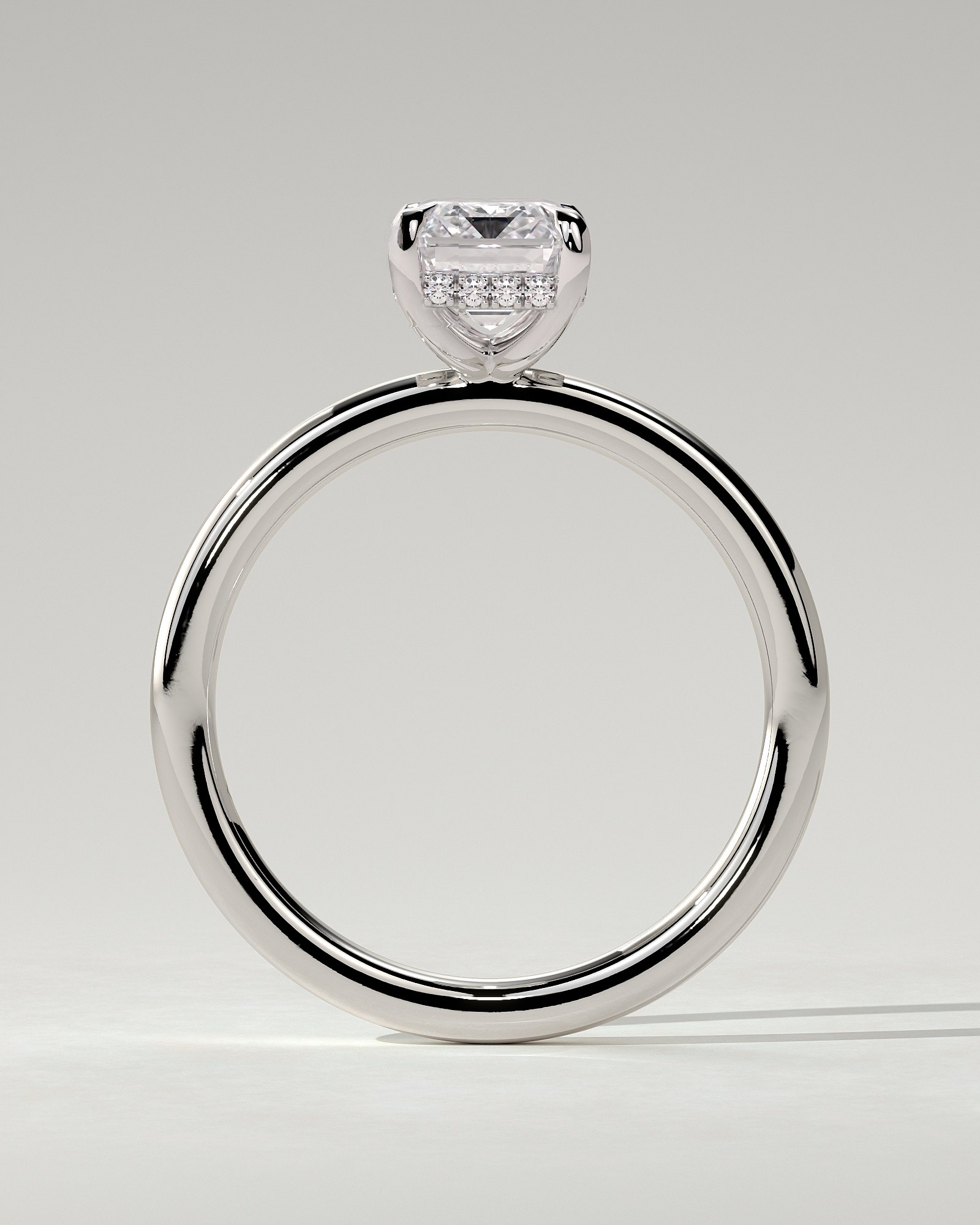 Alice Solitaire Emerald Ring