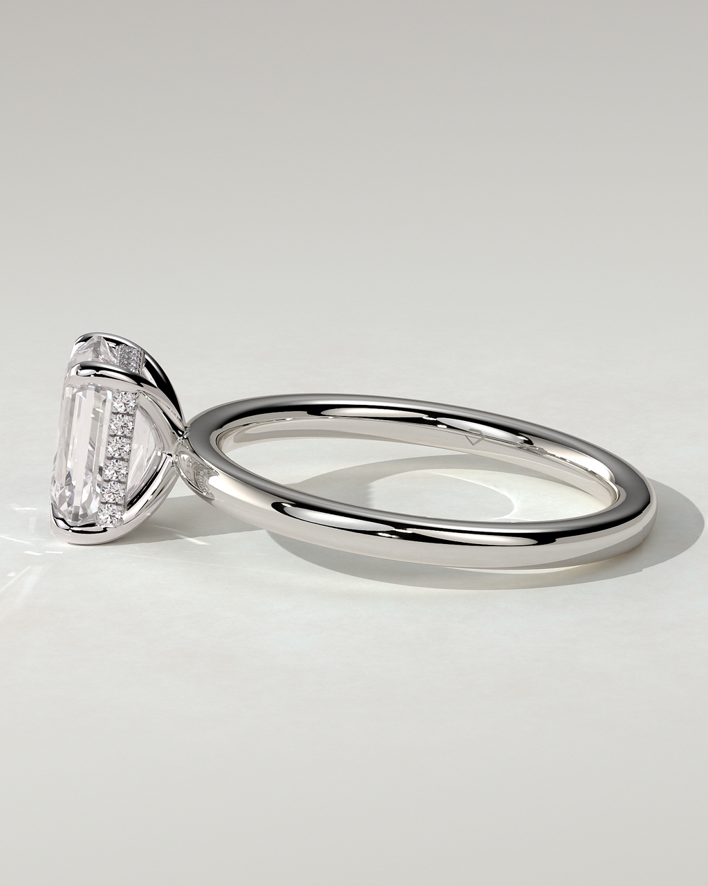 Alice Solitaire Emerald Ring