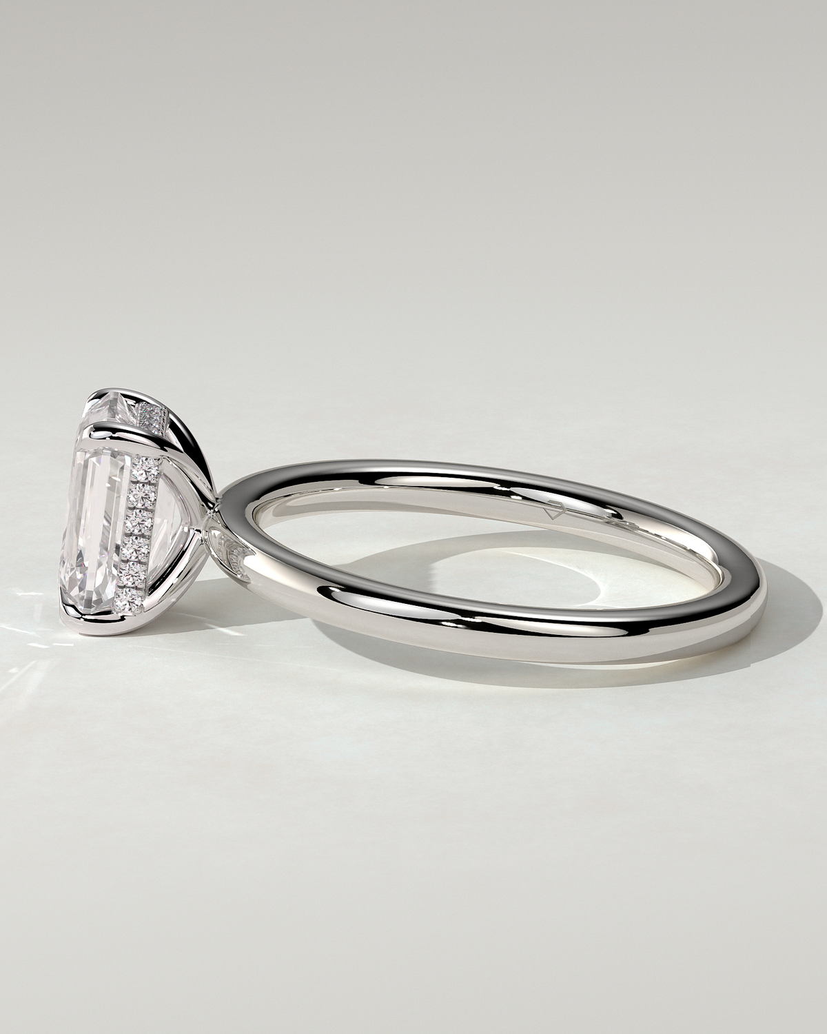 Alice Solitaire Emerald Ring