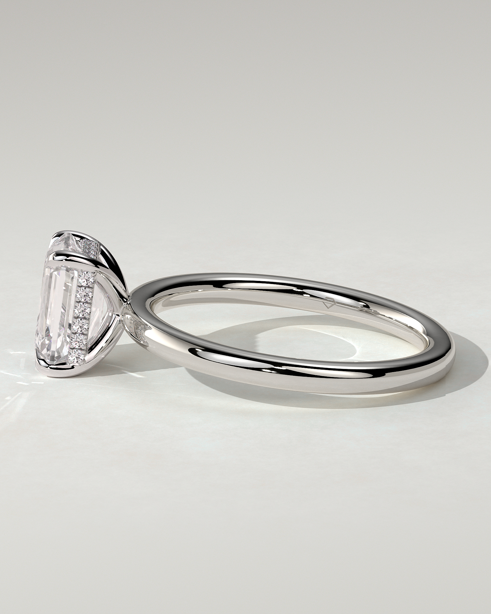 Alice Solitaire Emerald Ring