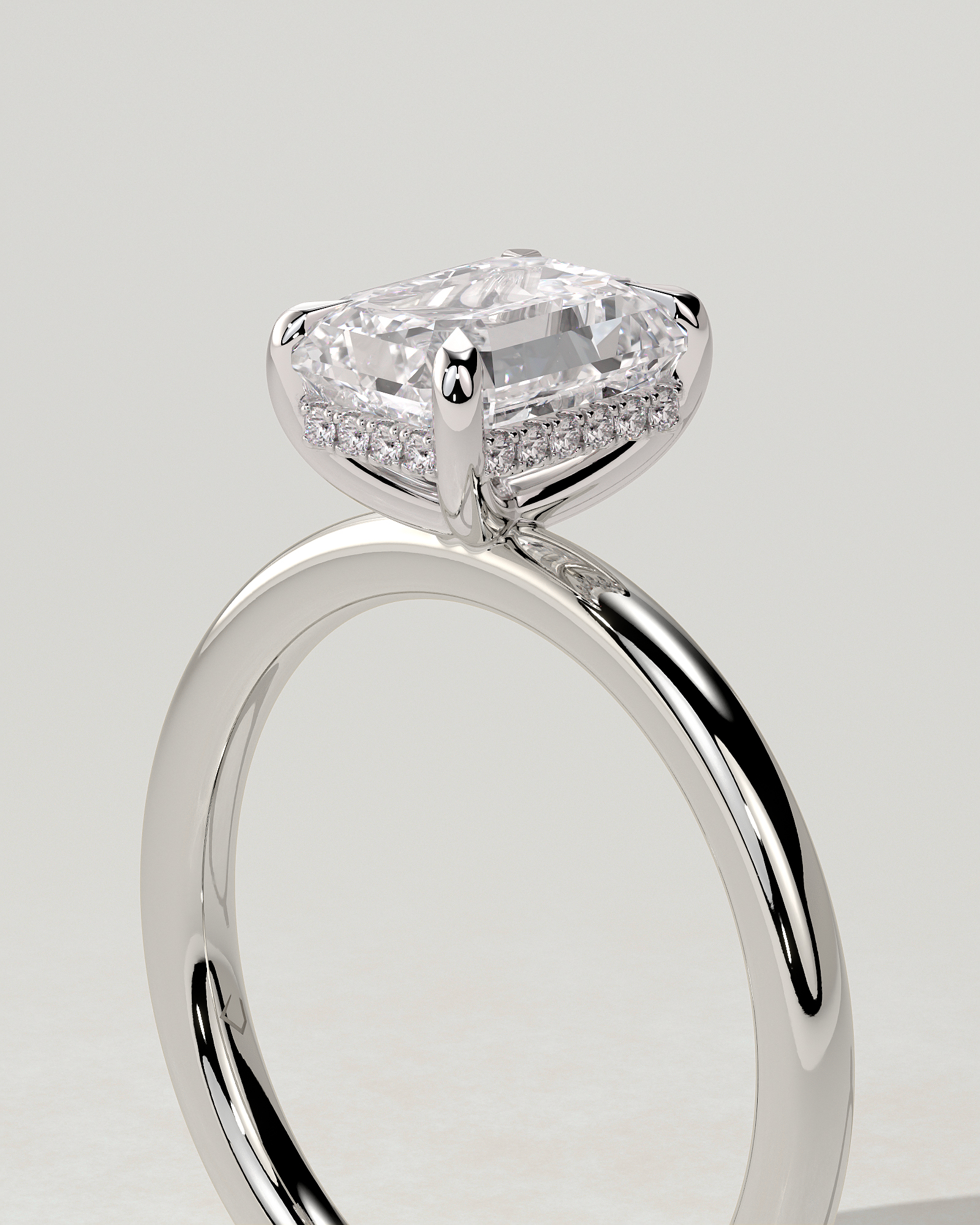 Alice Solitaire Emerald Ring