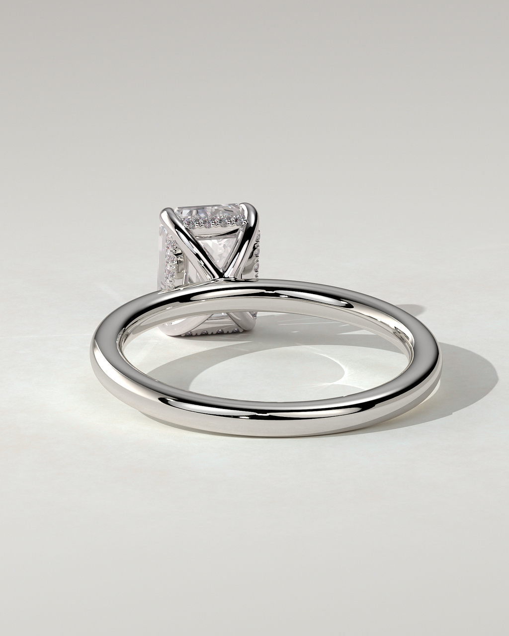 Alice Solitaire Emerald Ring