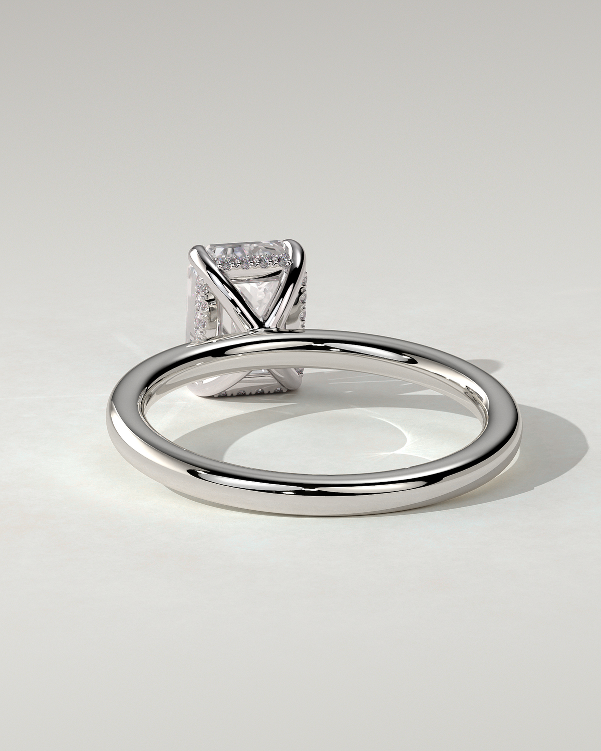 Alice Solitaire Emerald Ring