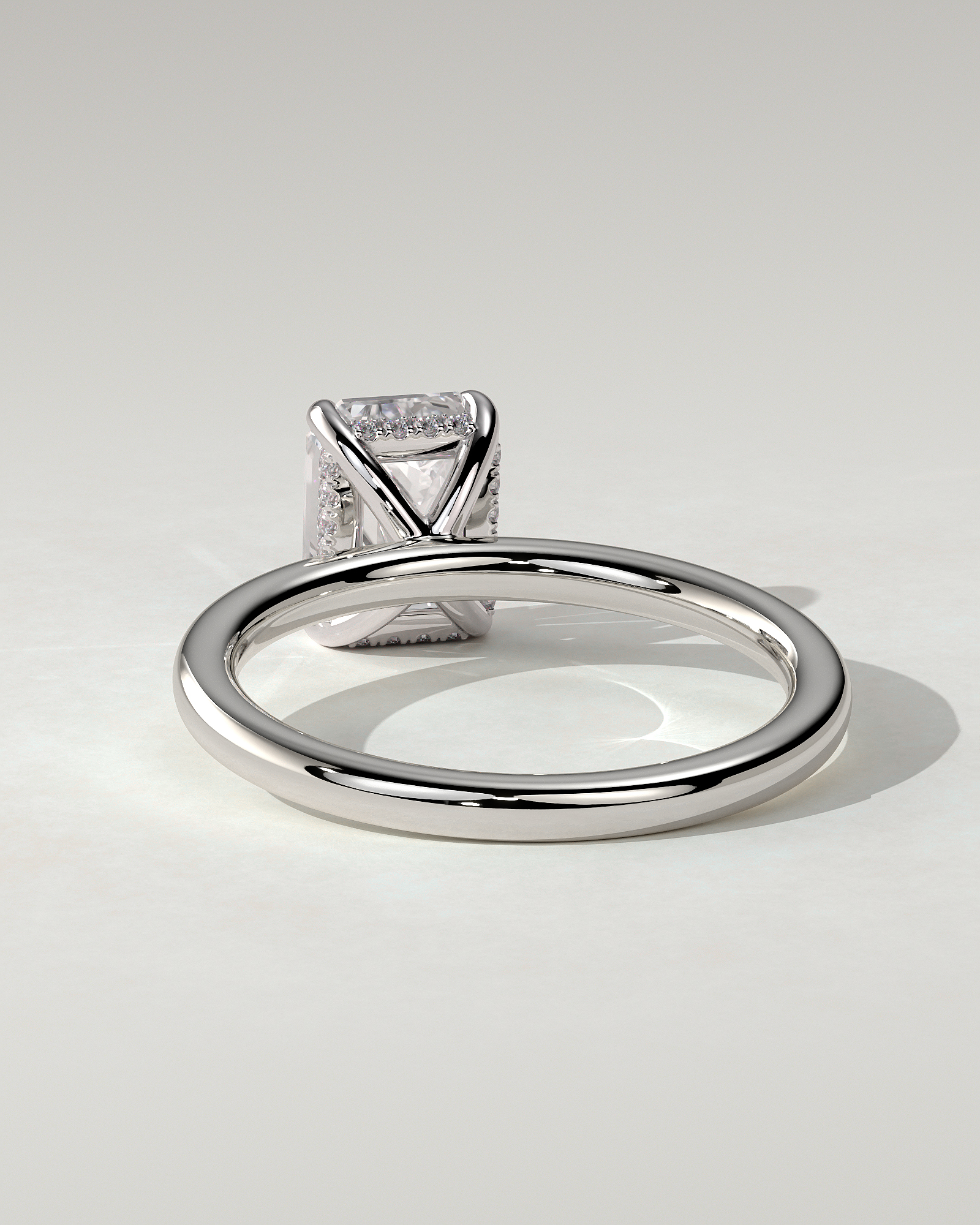 Alice Solitaire Emerald Ring