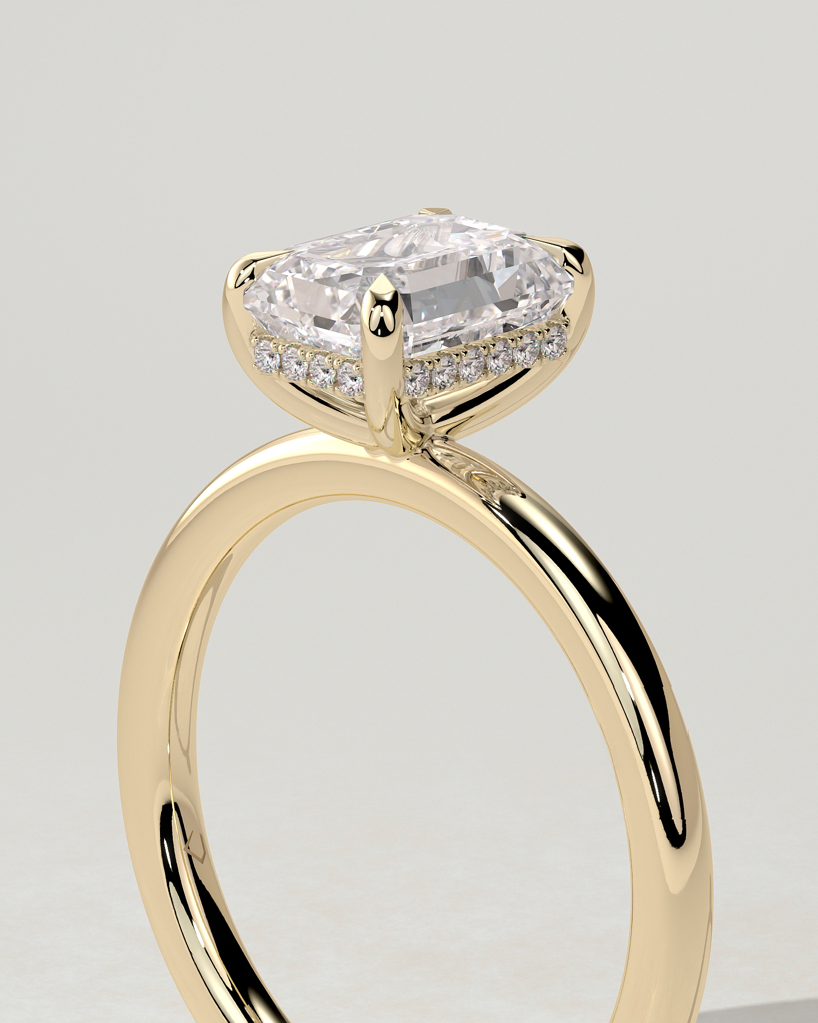 Alice Solitaire Emerald Ring