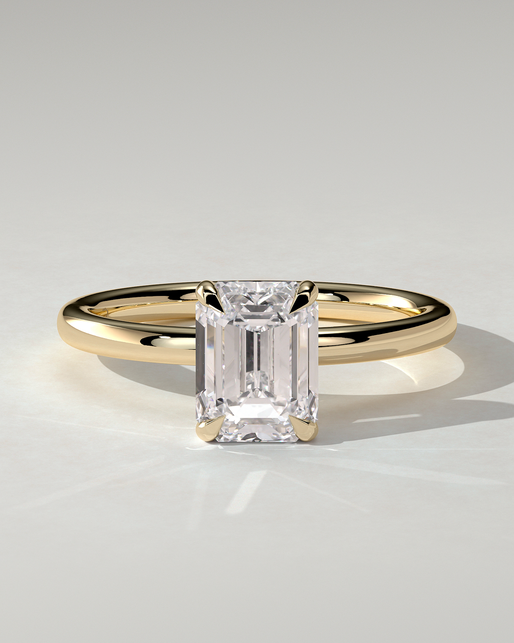 Alice Solitaire Emerald Ring