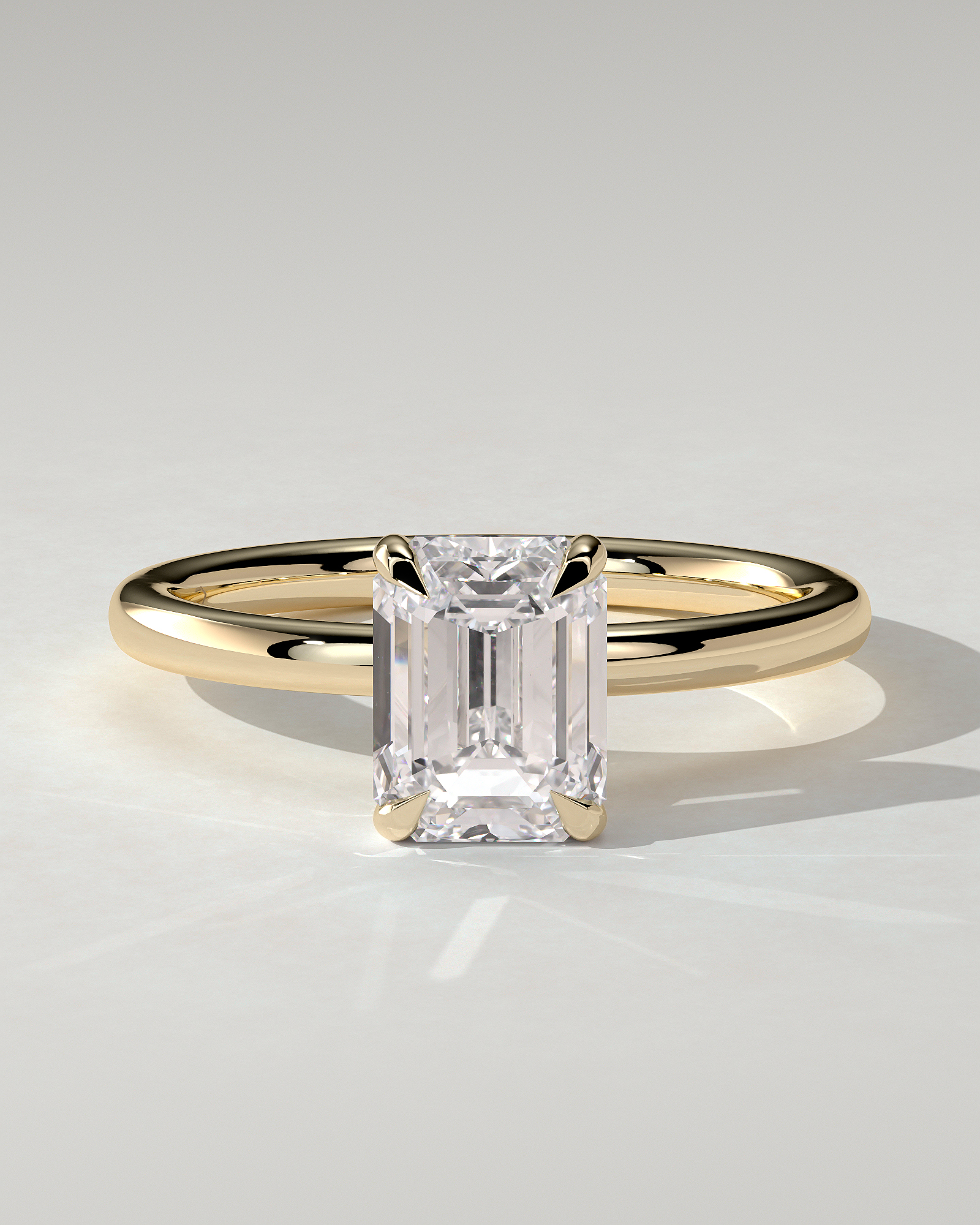 Alice Solitaire Emerald Ring