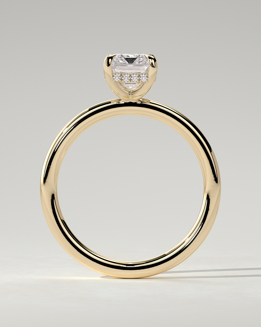 Alice Solitaire Emerald Ring