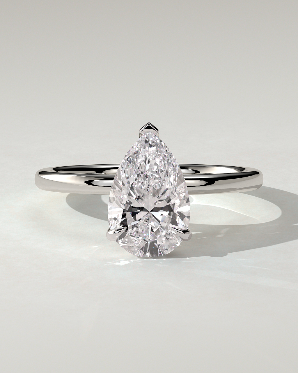 Amy Solitaire Pear Ring