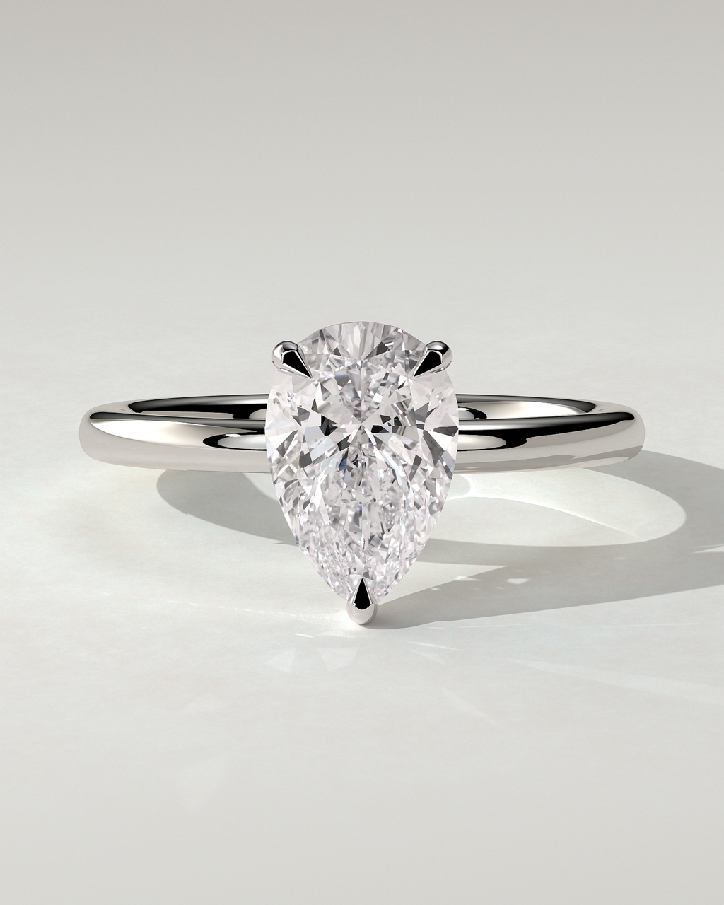 Amy Solitaire Pear Ring