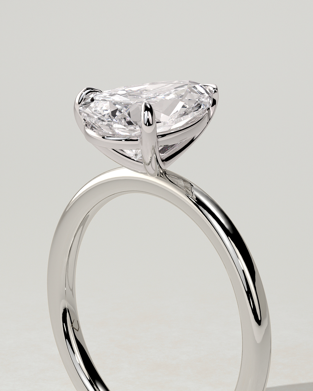Amy Solitaire Pear Ring