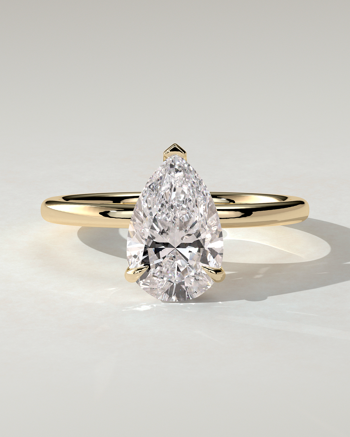 Amy Solitaire Pear Ring