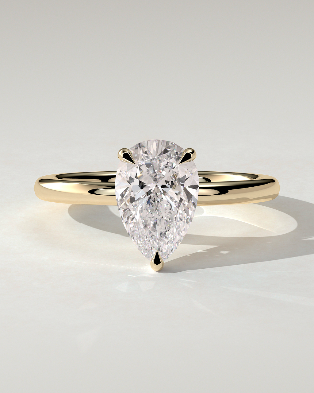 Amy Solitaire Pear Ring