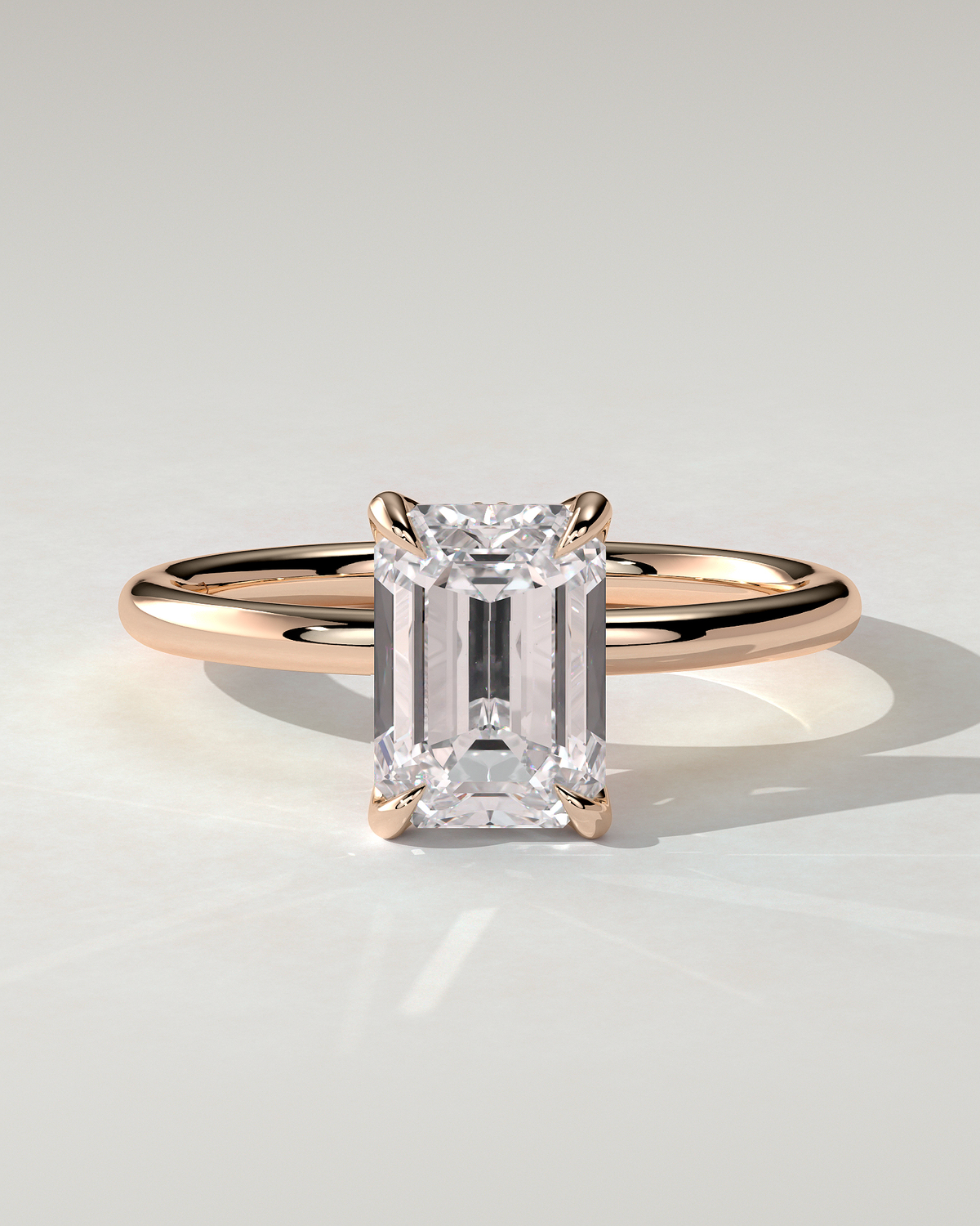 Freesia Solitaire Emerald Ring
