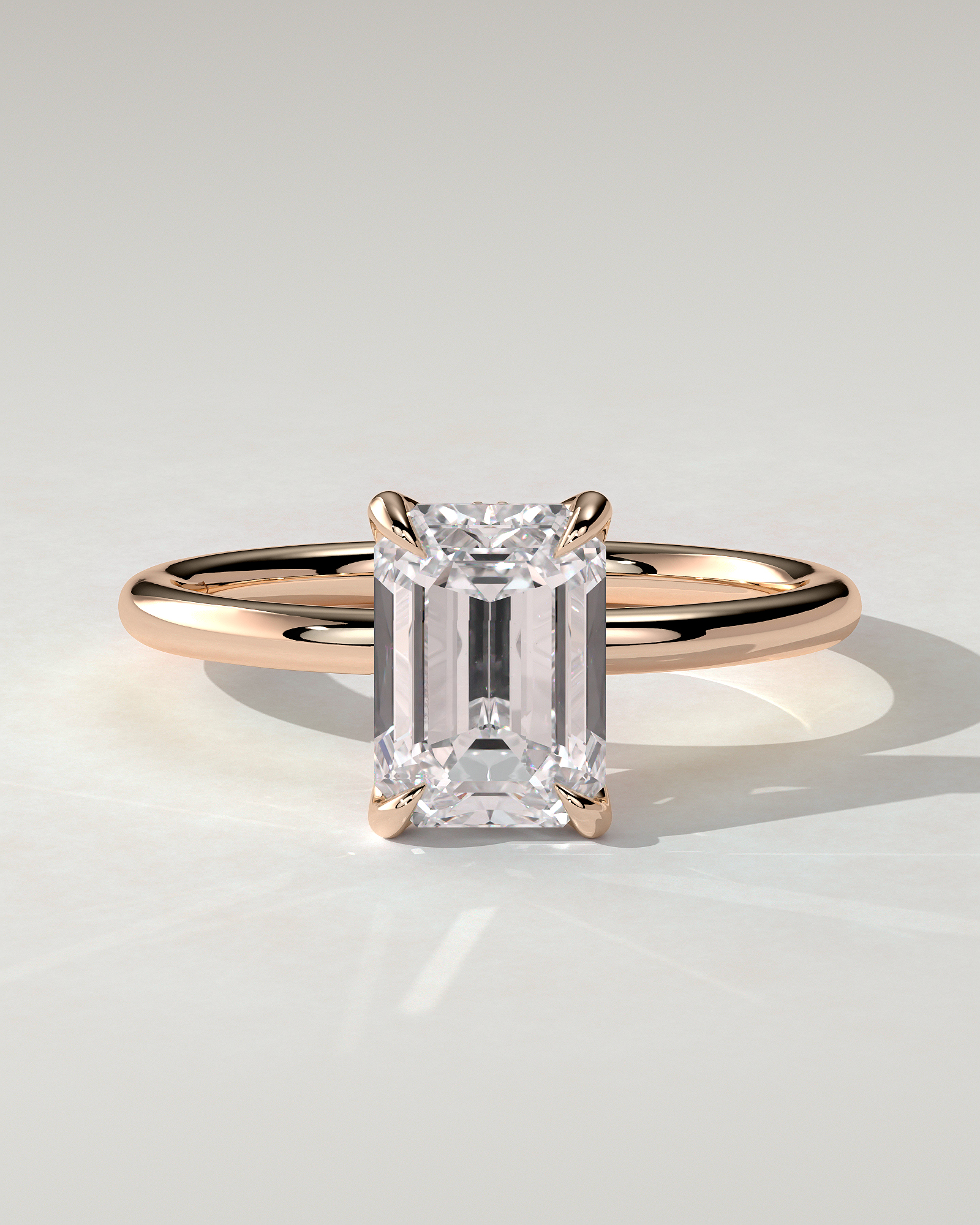 Freesia Solitaire Emerald Ring