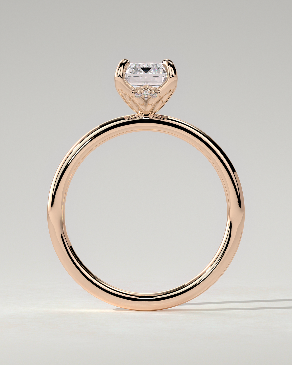 Freesia Solitaire Emerald Ring