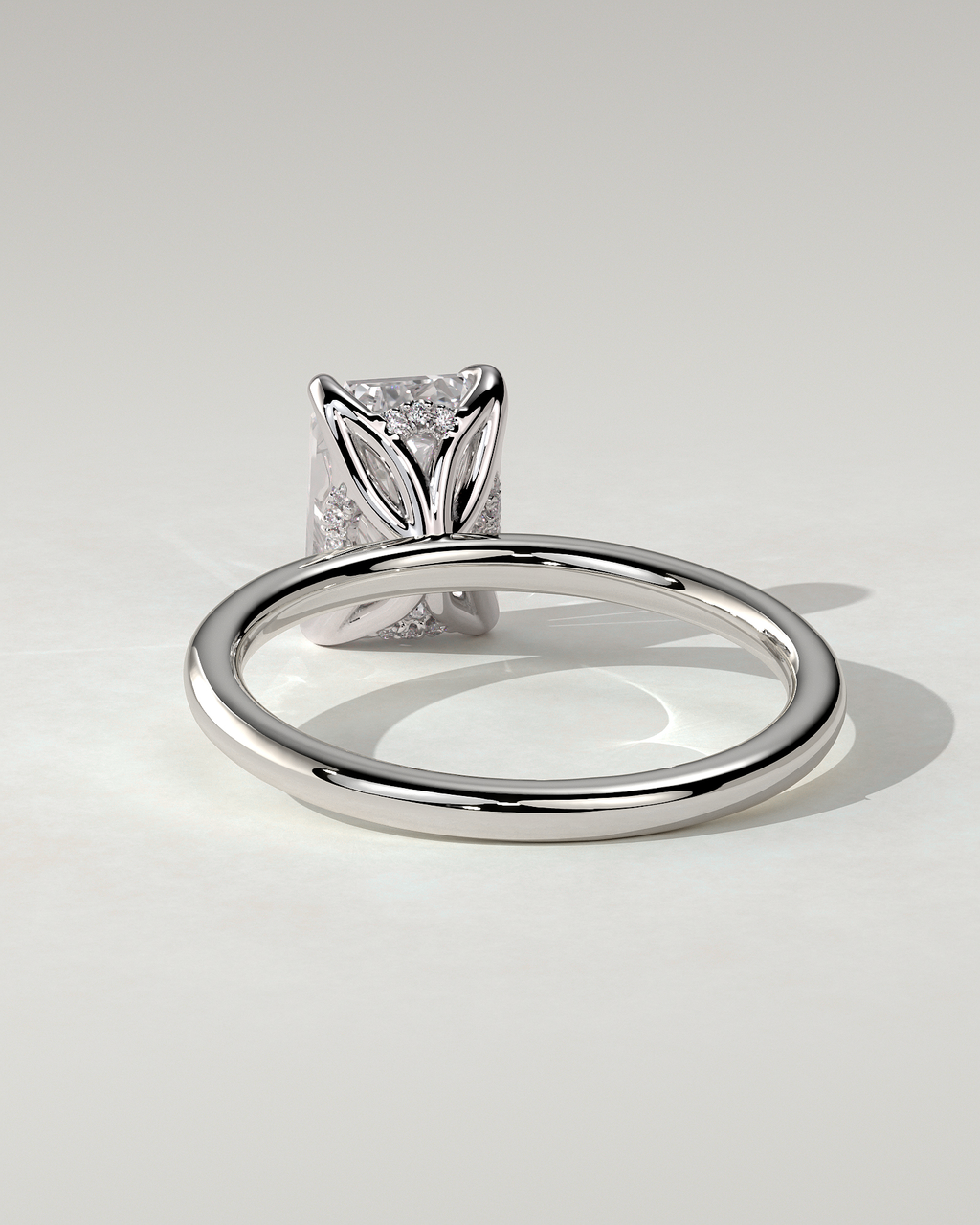 Freesia Solitaire Emerald Ring