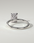 Freesia Solitaire Emerald Ring