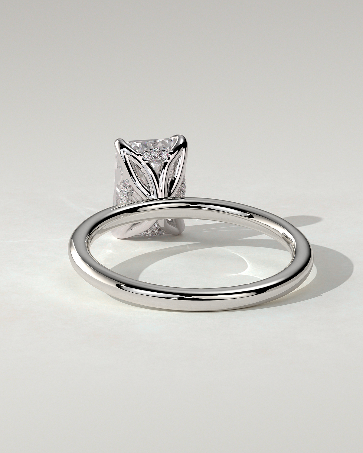 Freesia Solitaire Emerald Ring