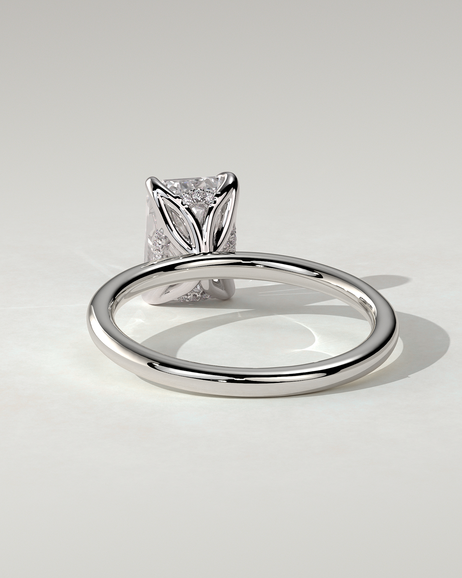 Freesia Solitaire Emerald Ring