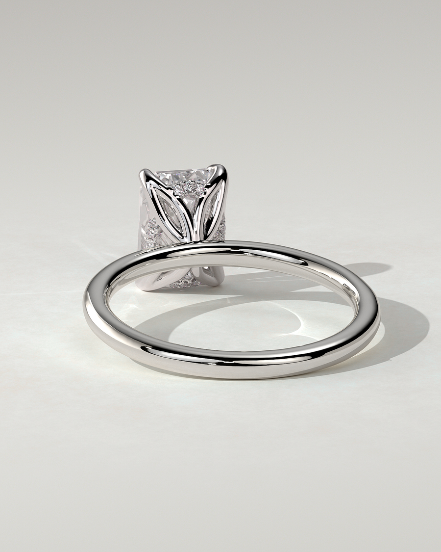 Freesia Solitaire Emerald Ring