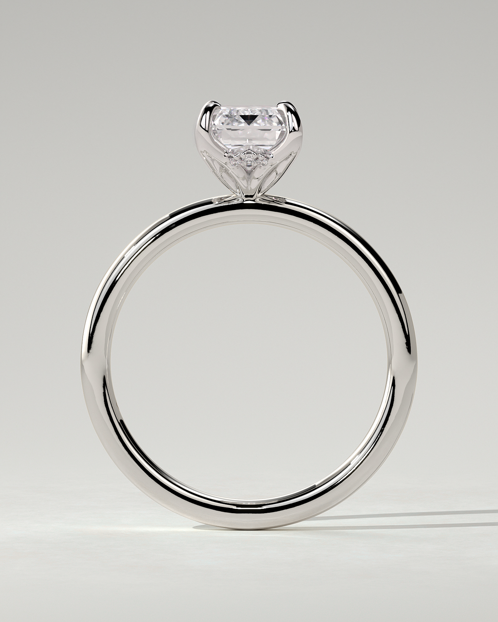 Freesia Solitaire Emerald Ring