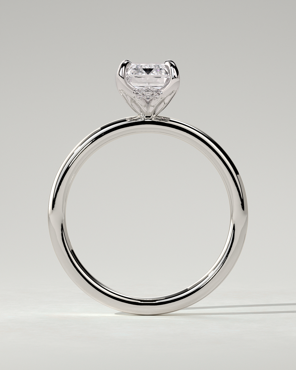 Freesia Solitaire Emerald Ring