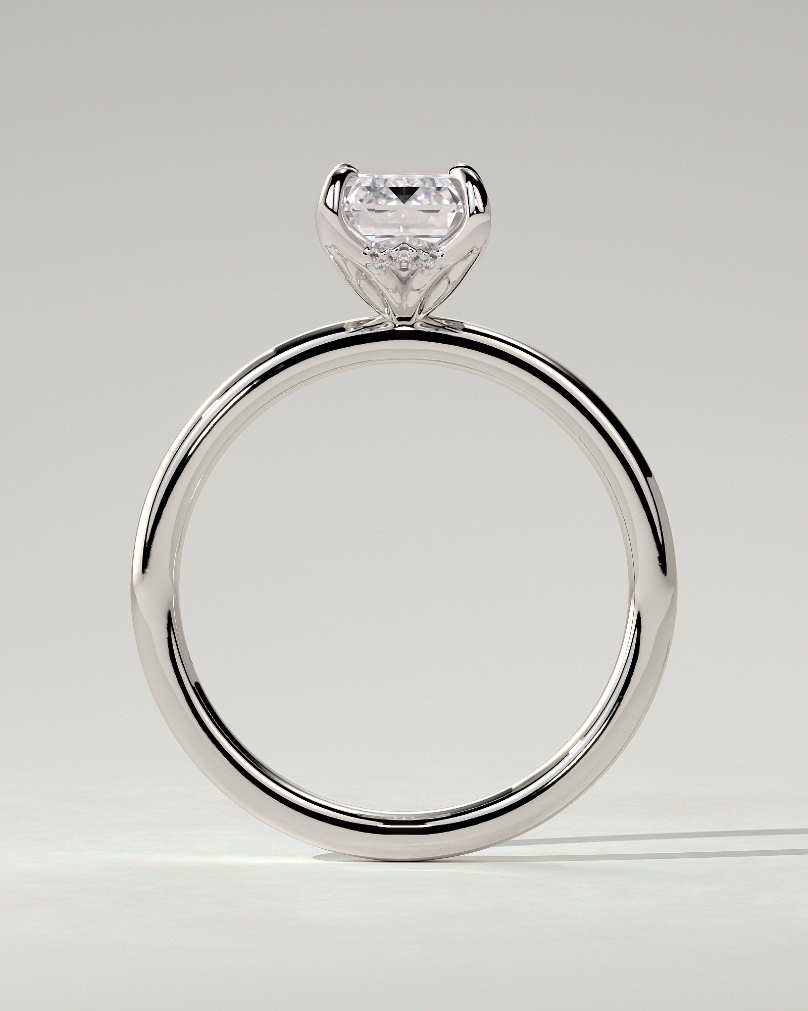 Freesia Solitaire Emerald Ring