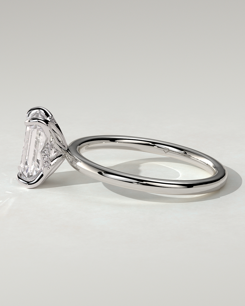 Freesia Solitaire Emerald Ring