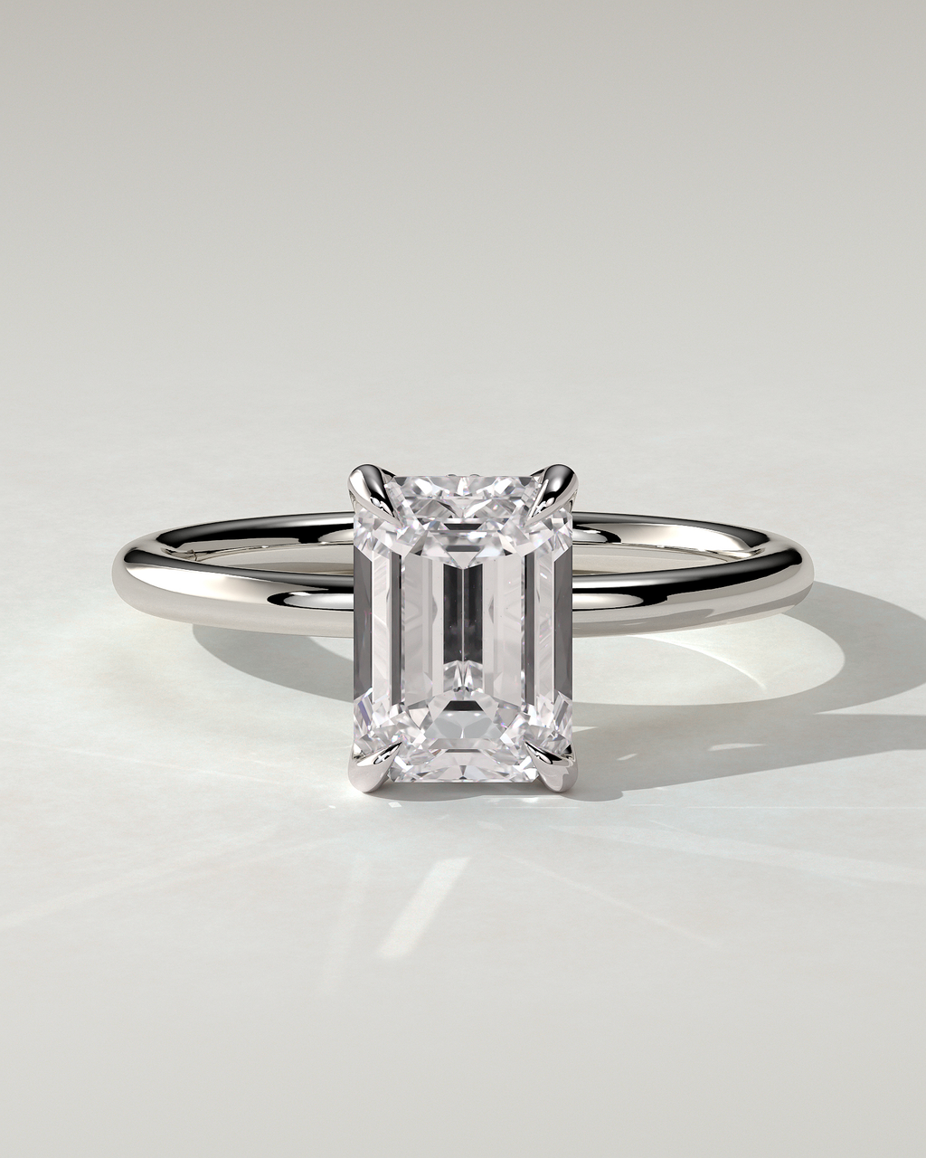 Freesia Solitaire Emerald Ring