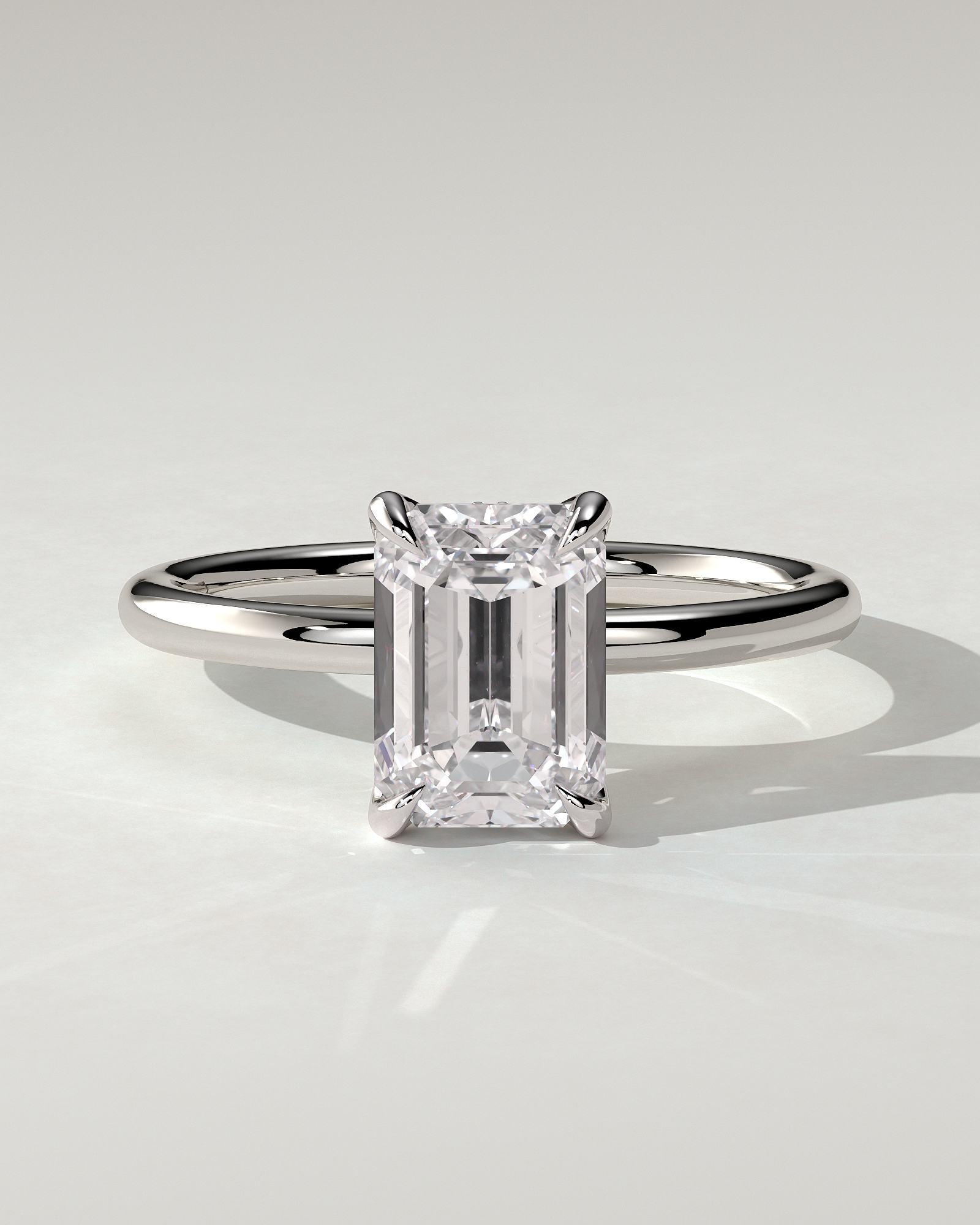 Freesia Solitaire Emerald Ring