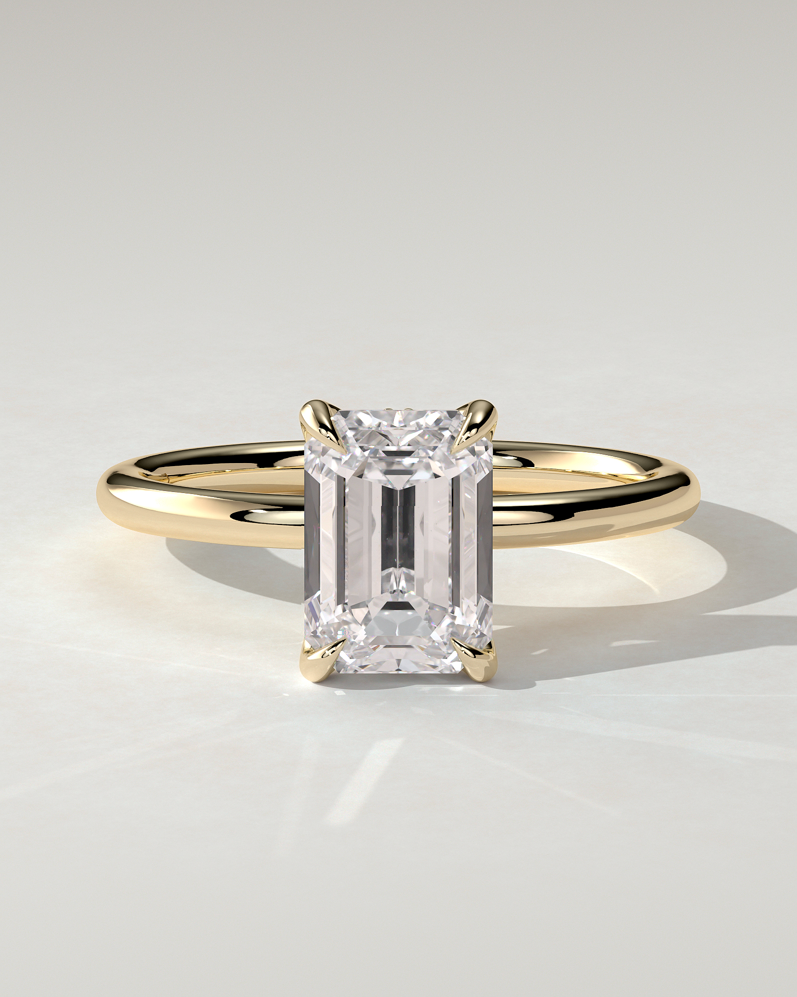 Freesia Solitaire Emerald Ring