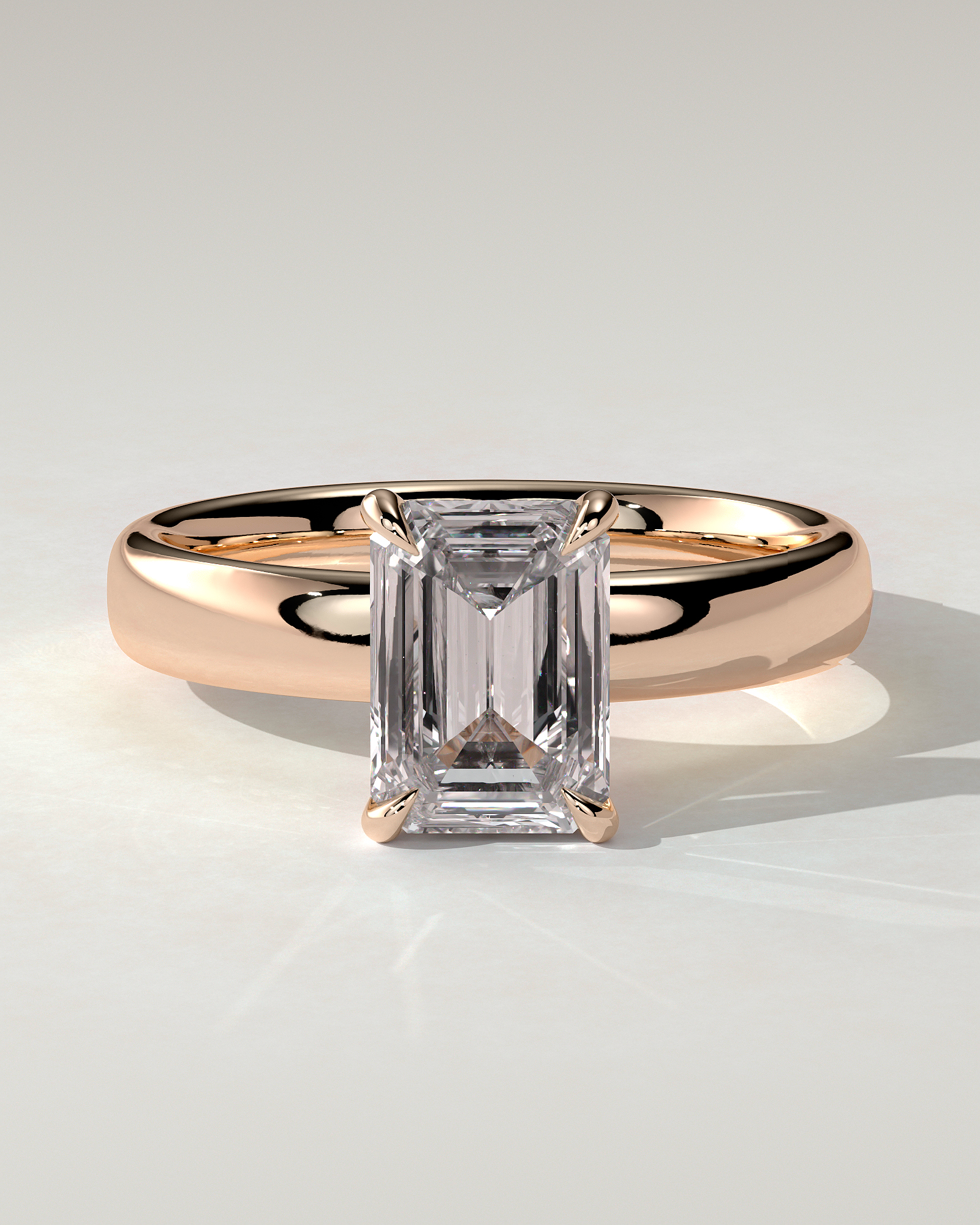 Kate Solitaire Emerald Ring