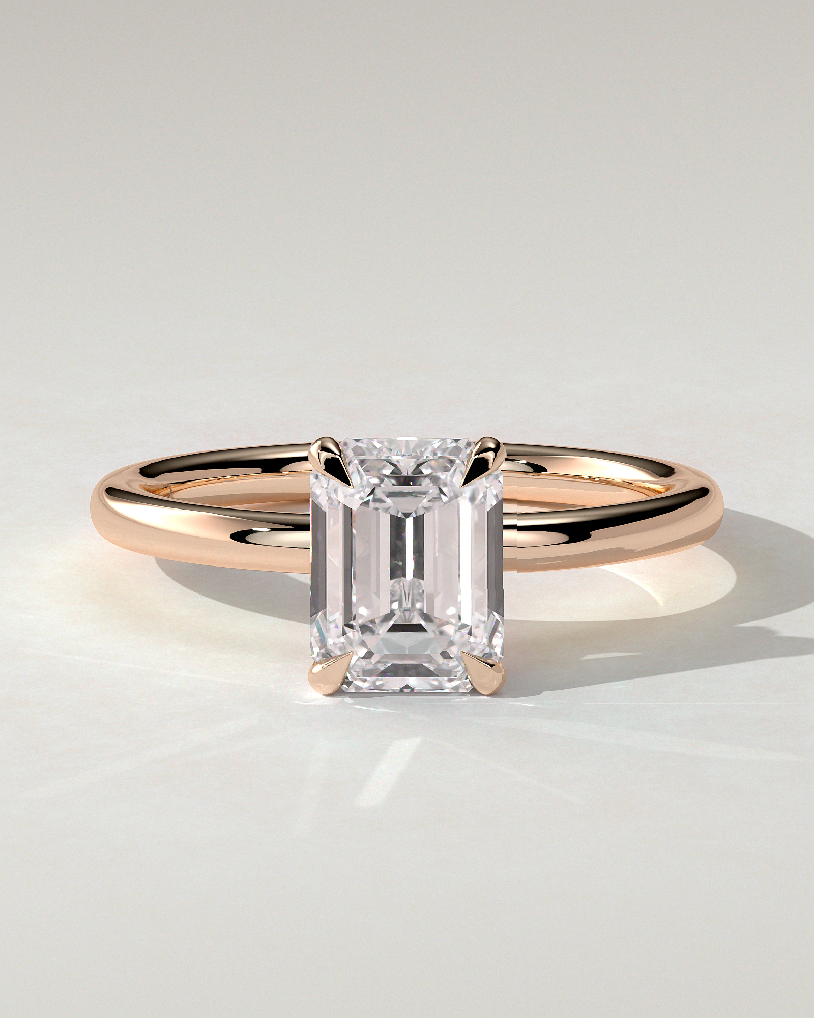 Miller Solitaire Emerald Ring