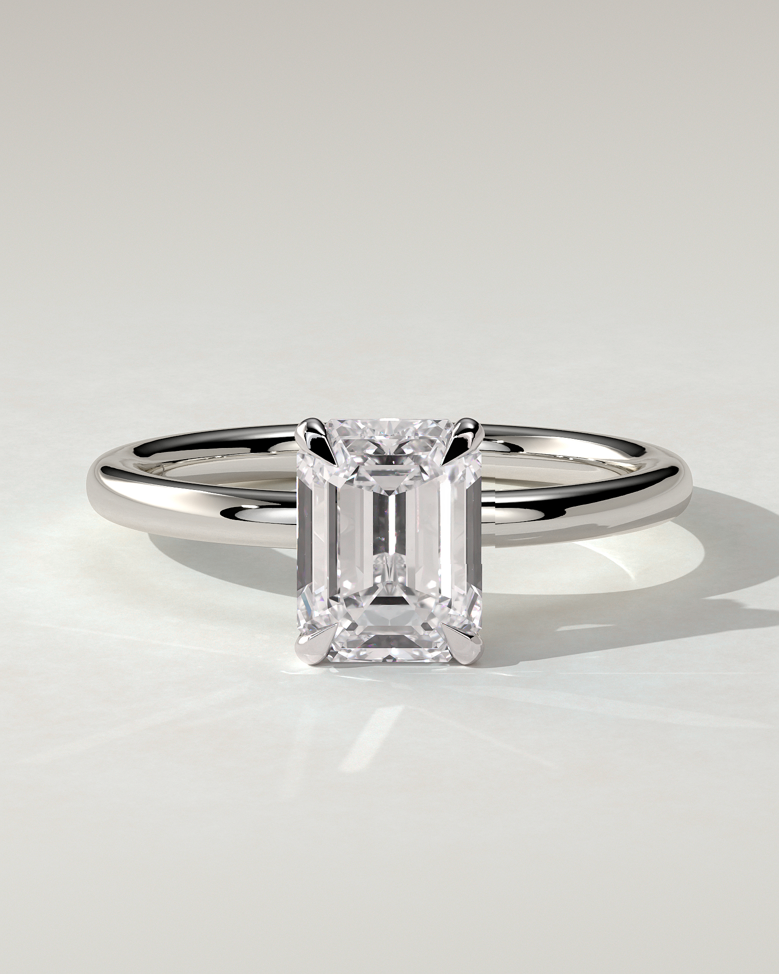 Miller Solitaire Emerald Ring