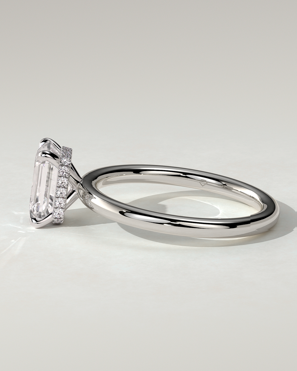Miller Solitaire Emerald Ring
