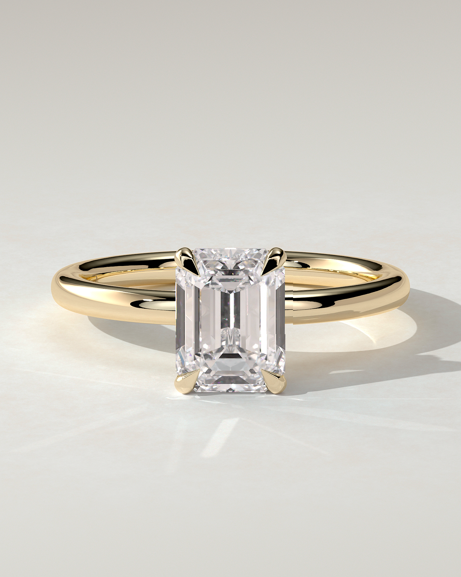 Miller Solitaire Emerald Ring