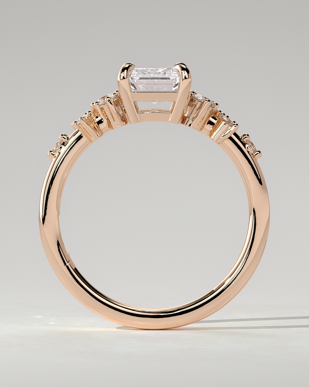 Nellie Solitaire Emerald Ring